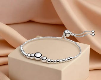 Beads Slider Bracelet String of Beads Shinny Silver Adjustable Bracelet Up to 25cm Long Unique and Fitted Personal Presents Collection