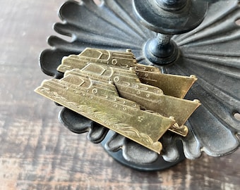 Vintage cabin cruiser pins, Brass boat brooches