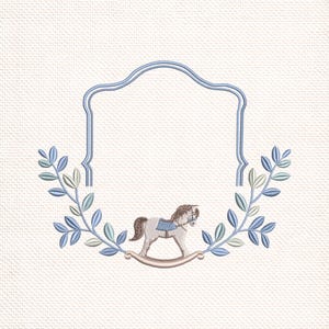 May include: Embroidered design featuring a rocking horse, framed by a blue and green leaf garland and a blue decorative border. The design is on a textured, off-white background, suitable for baby-themed crafts.