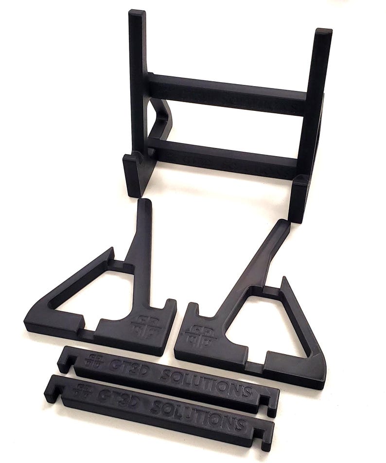 Display your wrestling championship belts in style with this sturdy wrestling belt display stand. This stand provides a secure and elegant way to showcase your title belts on desks, shelves, or display cases. Ideal for collectors, fans, and wrestlers who want to present their belts without wall installation. The sleek design ensures stability while highlighting your belt's details, making it the perfect centerpiece for your wrestling memorabilia collection.