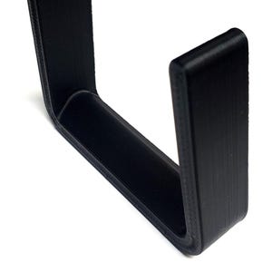 Show off your championship pride with this premium wrestling belt wall mount hanger. This L-shaped hook system is designed to securely hold and display your wrestling championship belts on any wall. Perfect for collectors, wrestling fans, or athletes, it keeps your title belts safe, organized, and proudly showcased. Easy to install with screws, this belt hanger is both functional and stylish, adding a professional look to your display space.