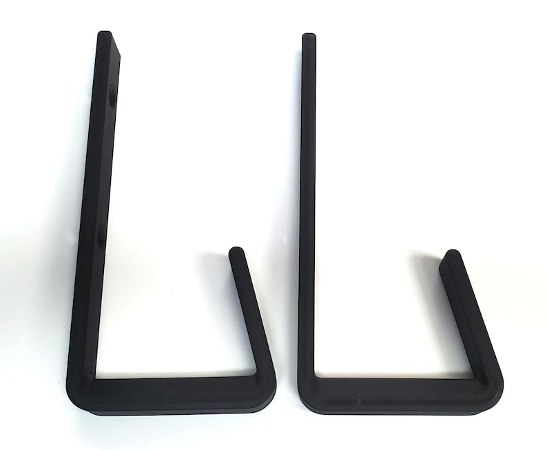 Show off your championship pride with this premium wrestling belt wall mount hanger. This L-shaped hook system is designed to securely hold and display your wrestling championship belts on any wall. Perfect for collectors, wrestling fans, or athletes, it keeps your title belts safe, organized, and proudly showcased. Easy to install with screws, this belt hanger is both functional and stylish, adding a professional look to your display space.