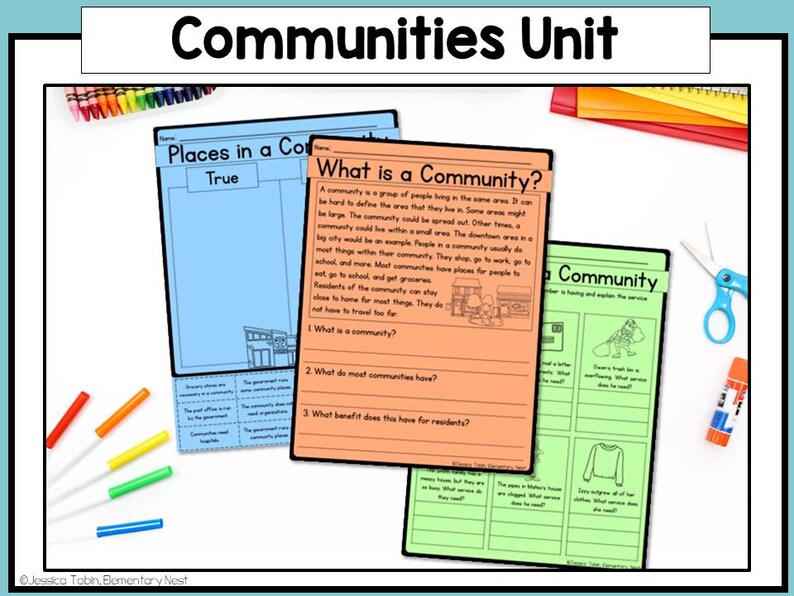 May include: A colorful educational display titled "Communities Unit" featuring worksheets on community concepts. The worksheets are in blue, orange, and green, with text and illustrations. Crayons, scissors, and glue are also visible.