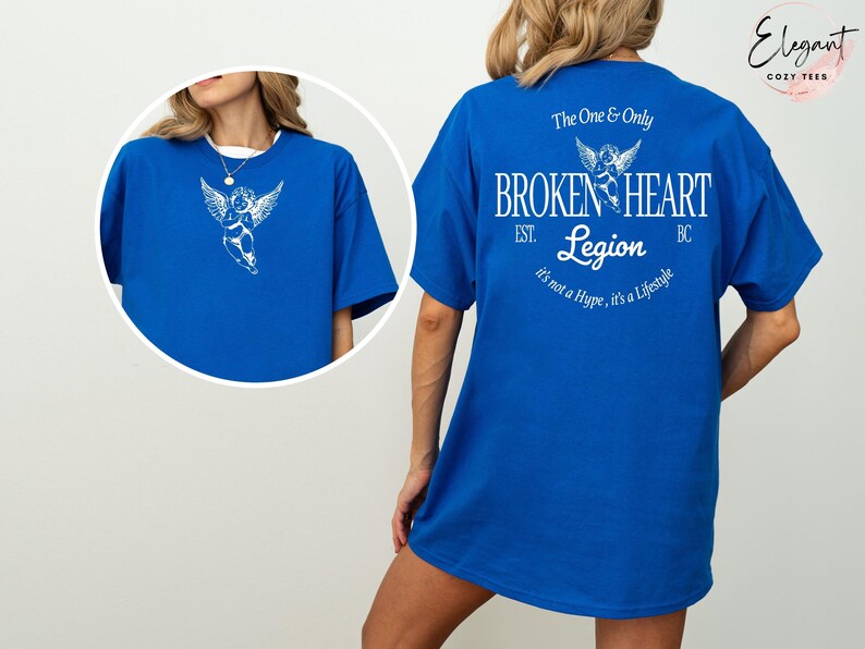 Blue t-shirt with "Broken Heart Legion" design on back, and angel graphic inset.