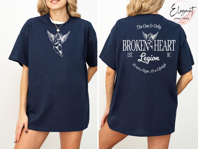 Navy t-shirt with "BROKEN HEART EST. Legion" and angel graphic on back.