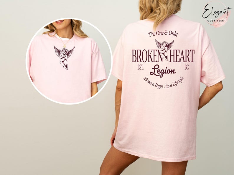 Pink t-shirt with angel graphic and "Broken Heart Legion" text.