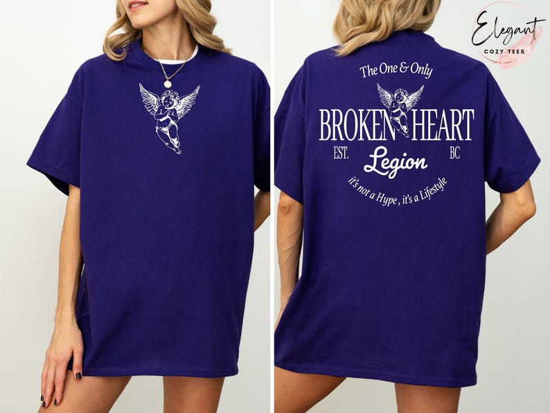 Dark blue t-shirt with angel and text "Broken Heart Legion" on back.