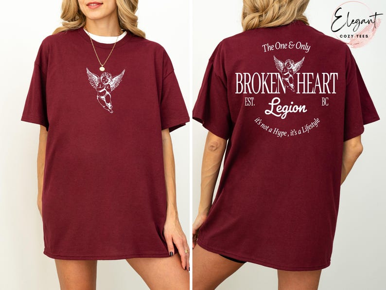 Burgundy t-shirt with angel graphic on front and "Broken Heart Legion" text on back.