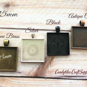 May include: Four 25mm square metal picture frames with a decorative pattern. The frames are shown in antique brass, silver, black, and antique copper.