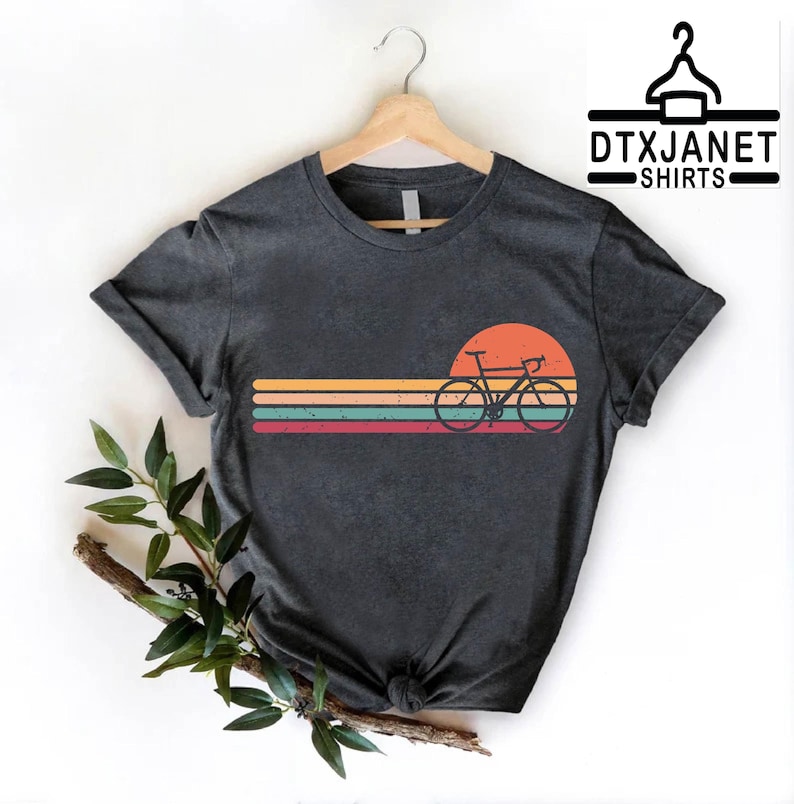 a black shirt with a bicycle on it