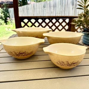 Pyrex Forest Fancies Four Piece Mixing Bowl Set in Pristine Condition