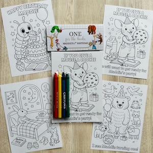 May include: A set of children's coloring pages and crayons. The pages feature illustrations of a caterpillar, a mouse, a bear, and a rabbit, with text like "Happy Birthday Maddie" and "If You Give a Mouse a Cookie". The crayons are red, yellow, blue, and green.