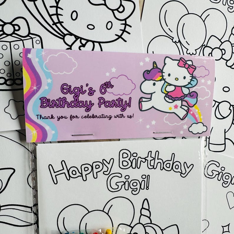 May include: A light purple birthday party favor with the text "Gigi's 6th Birthday Party!" and a cartoon image of Hello Kitty riding a unicorn. The favor also includes the text "Thank you for celebrating with us!" and is surrounded by black and white colouring pages.
