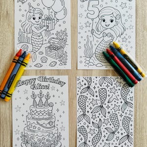May include: Four mermaid-themed coloring pages with crayons. The pages feature mermaids, a birthday cake, and mermaid tails. One page says "Alice's dive into 5", and another says "Happy Birthday Alice!"