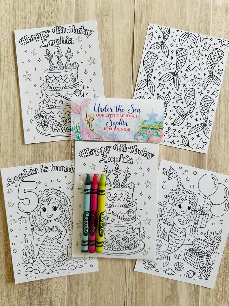 May include: A collection of mermaid-themed coloring pages and a small card. The coloring pages feature birthday cakes, mermaids, and the text "Happy Birthday Sophia". The small card reads "Under the Sea Our Little Mermaid Sophia is turning 5!" and includes crayons.