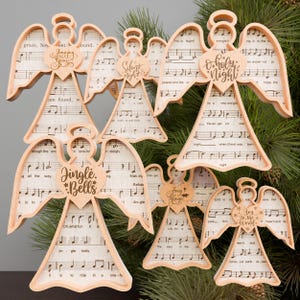 Adornos navideños con partituras musicales SVG, canciones navideñas SVG, adornos de ángel SVG, adornos navideños, decoración navideña, regalo de Navidad/P238