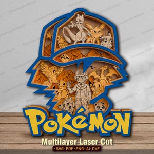 May include: A multi-layered wooden wall art piece shaped like a baseball cap, featuring laser-cut engravings of various animated creatures and a central human character. The design includes the yellow and blue text Pokémon at the bottom.