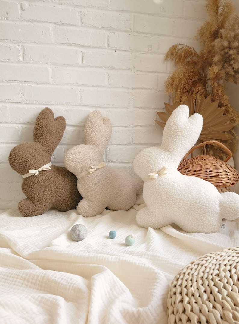 Bunny pillow in neutral nursery decor, soft rabbit cushion for baby and toddler room