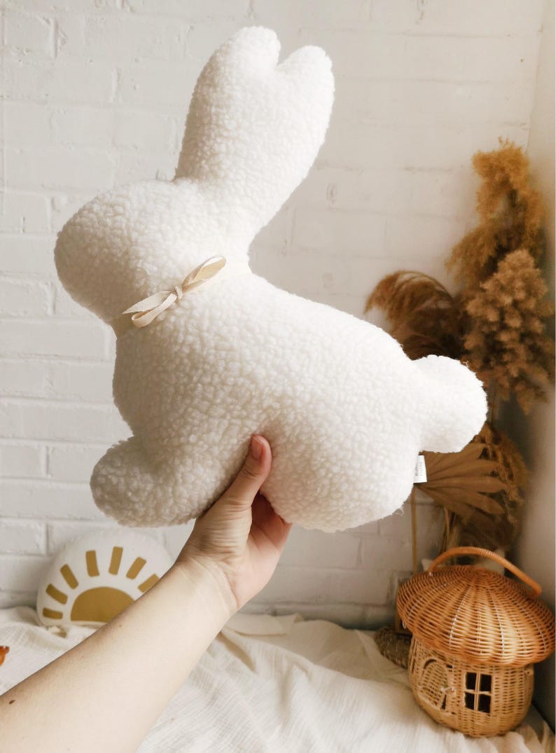 Soft plush bunny pillow detail, cozy rabbit cushion for kids room and nursery