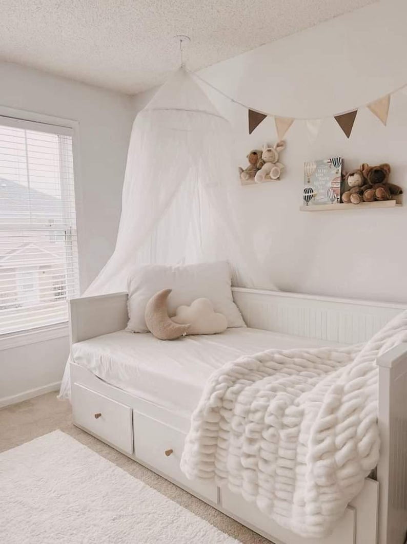 May include: A distressed wooden sign, reading "Welcome to our home" in white lettering. The sign has a rustic finish, ideal for a front door or hallway, creating a welcoming atmosphere.