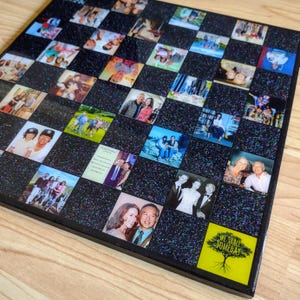 May include: A black and silver square photo collage with a black glitter background. The collage is filled with photos of people and has a yellow square in the bottom right corner with the text "We Shall Someday".