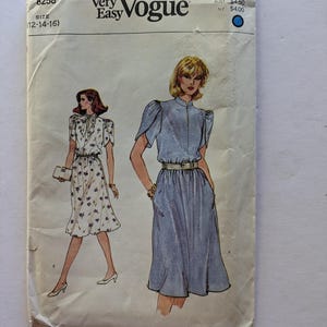 Very Easy Vogue Sewing Pattern 8258 Ladies Loose Fitting Pullover Dress with Flared Skirt Short Sleeves Uncut Size 12-14-16