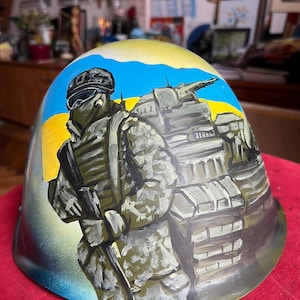 12. russian soldier&#39;s helmet, the trophy from war in Ukraine / Souvenirs from war in Ukraine