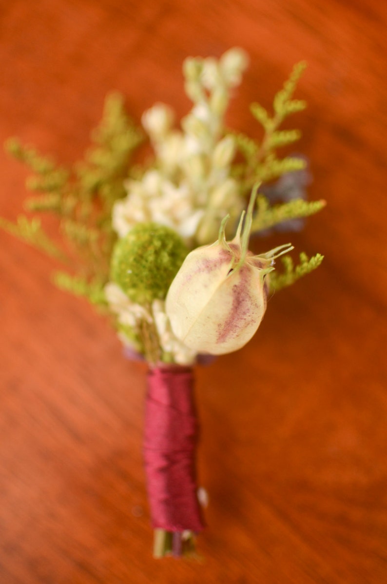burgundy boutonniere fall wedding fall boutonniere winter bouutonniere winter wedding Marsala and cream boutonniere