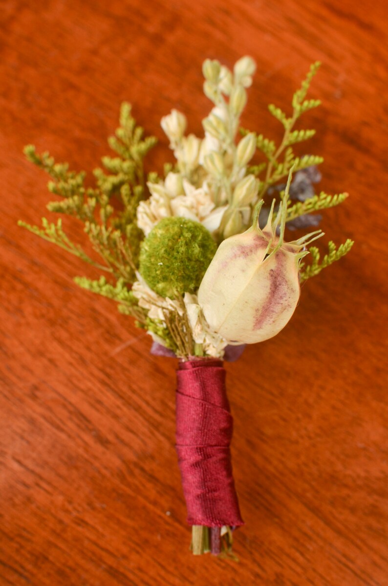 burgundy boutonniere fall wedding fall boutonniere winter bouutonniere winter wedding Marsala and cream boutonniere