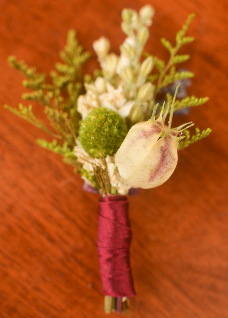 burgundy boutonniere fall wedding fall boutonniere winter bouutonniere winter wedding Marsala and cream boutonniere