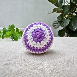 Purple spiral crochet hacky sack pattern, white and purple swirl amigurumi footbag, beginner fidget toy PDF tutorial