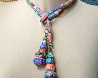 Long textile lariat necklace with totem stack polymer clay pendants