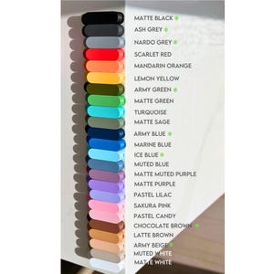a collection of various colored markers or pens, each with a different color and size, arranged in a vertical column.