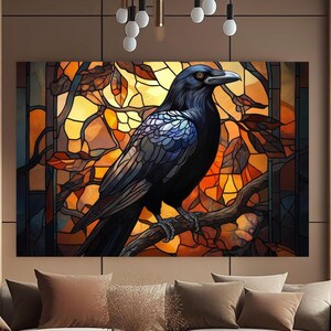 May include: A large, rectangular stained-glass art piece featuring a black raven perched on a branch. The raven has iridescent blue and purple feathers. The background is a mosaic of warm orange and yellow tones, resembling autumn leaves.