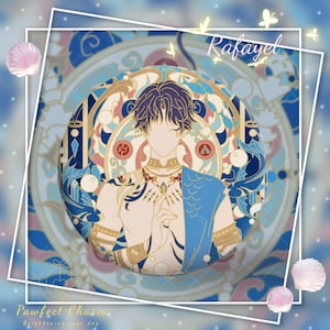 May include: A blue and gold enamel pin featuring a character with blue hair and a blue and gold outfit. The character is surrounded by a decorative floral design. The pin says "Raphael" at the top.