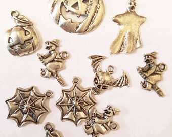 10 silver halloween metal charms pendants mixed lot 15mm to 26mm bat skull pumpkin spider webs goth jewelry making supplies
