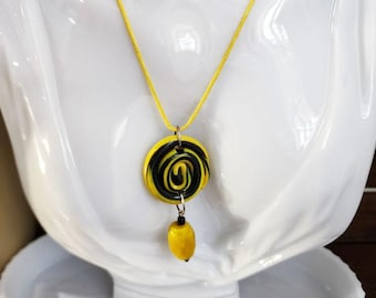 black and yellow spiral clay pendant glass bead drop necklace cord handmade jewelry