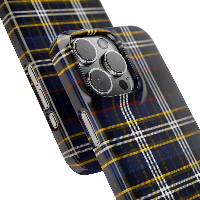 May include: A black phone case with a blue, yellow, and white plaid pattern. The case has a raised camera bump with a black camera lens.