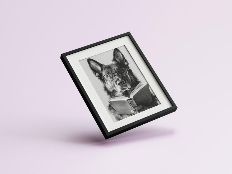 black and white photo of a german shepherd wearing glasses reading a book