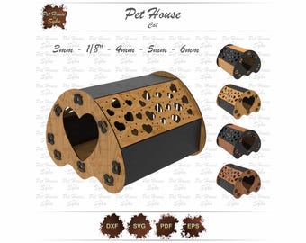 May include: A laser cut cat house made of wood with a heart-shaped opening. The house is painted black and has a brown wood trim. The house is designed for a cat to sleep in and has a heart-shaped opening for the cat to enter and exit. The house is designed to be assembled by the buyer.