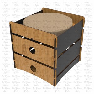 Puede incluir: Una casa para mascotas de madera con exterior marr&oacute;n claro y detalles en gris oscuro. El dise&ntilde;o presenta una cama redonda y acolchada en el interior. La estructura tiene dos aberturas circulares y est&aacute; etiquetada como "Laser Cut File".
