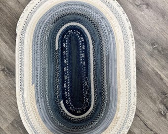 Handmade Winter-Themed Cotton Oval Rug (42"x28.5" ) Featuring Whimsical Snowmen and Snowflake Prints. Machine Wash and Dry