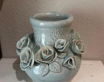Vaso di rose verdi