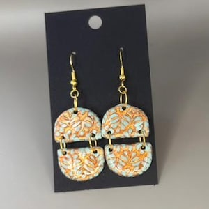 Green and copper dangle earrings