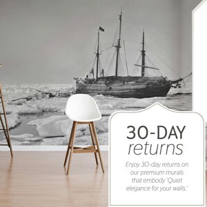 May include: A black and white mural of a ship sailing through icy waters. A white chair with wooden legs and a wooden ladder are in front of the mural. The text "30-DAY returns" is displayed on the right.