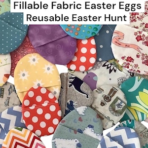 May include: A white ceramic mug with a black handle and the text "But First, Coffee" in a bold, black font. The mug is set against a blurred background. The mug appears to be approximately 10 cm tall.