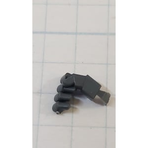 May include: A gray plastic hand with five fingers, designed for use with miniature figures.