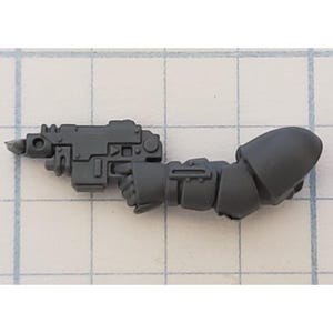 May include: A gray plastic miniature arm and weapon, likely for a tabletop game. The arm is articulated, and the weapon is a detailed, futuristic firearm. The miniature is unpainted and ready for customization.