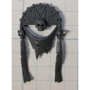 May include: A gray plastic miniature wargaming banner with a skull and a sunburst design. The banner is tattered and has two long tassels.
