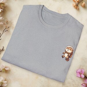 Bonita camiseta de nutria de dibujos animados para hombre del espacio: adorable camiseta de astronauta de anime, diseño de nutria interestelar, ropa de aventura cósmica, regalo del espacio exterior